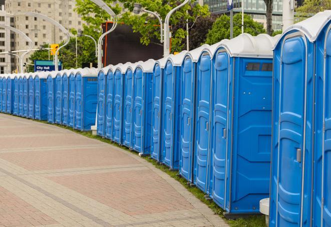 colorful portable restrooms available for rent at a local fair or carnival in Colonie, NY